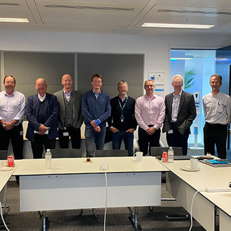 Net zero round table participants in a meeting room