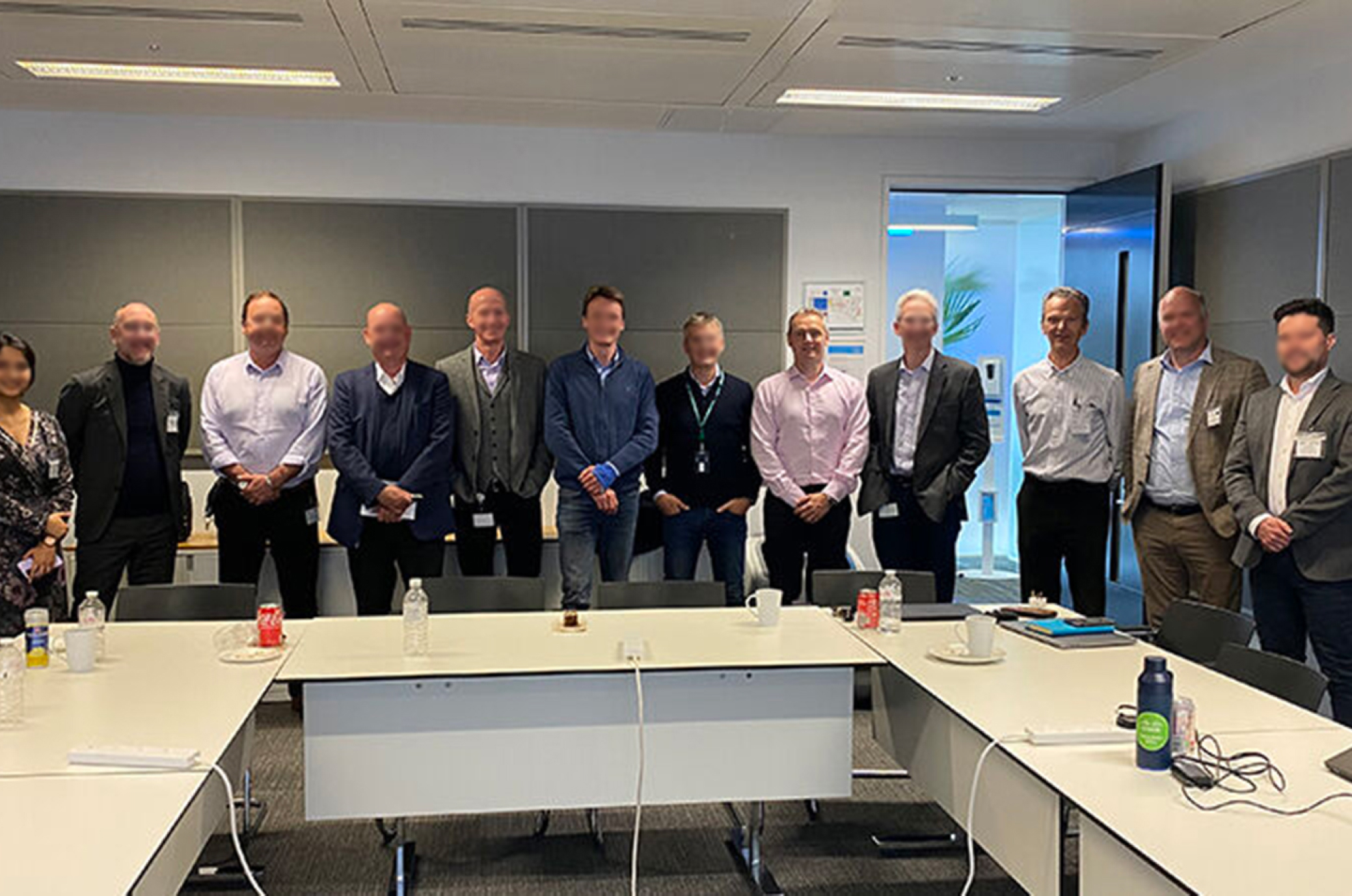 Net zero round table participants in a meeting room